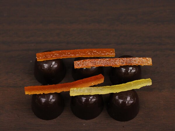 For Whiskey, Brandy, and Vodka, we select 66% Dark Chocolate, Single Origin—Pure Ecuador. Ecuador has been known as one of the best places to produce cocoa, with a history dating back to the 17th century. The warm, humid climate has provided a perfect environment for cocoa trees to grow, giving a unique taste profile to the chocolate. When it melts in your mouth, you can sense a primary note of jasmine floral taste, followed by a secondary oaky and woody taste.